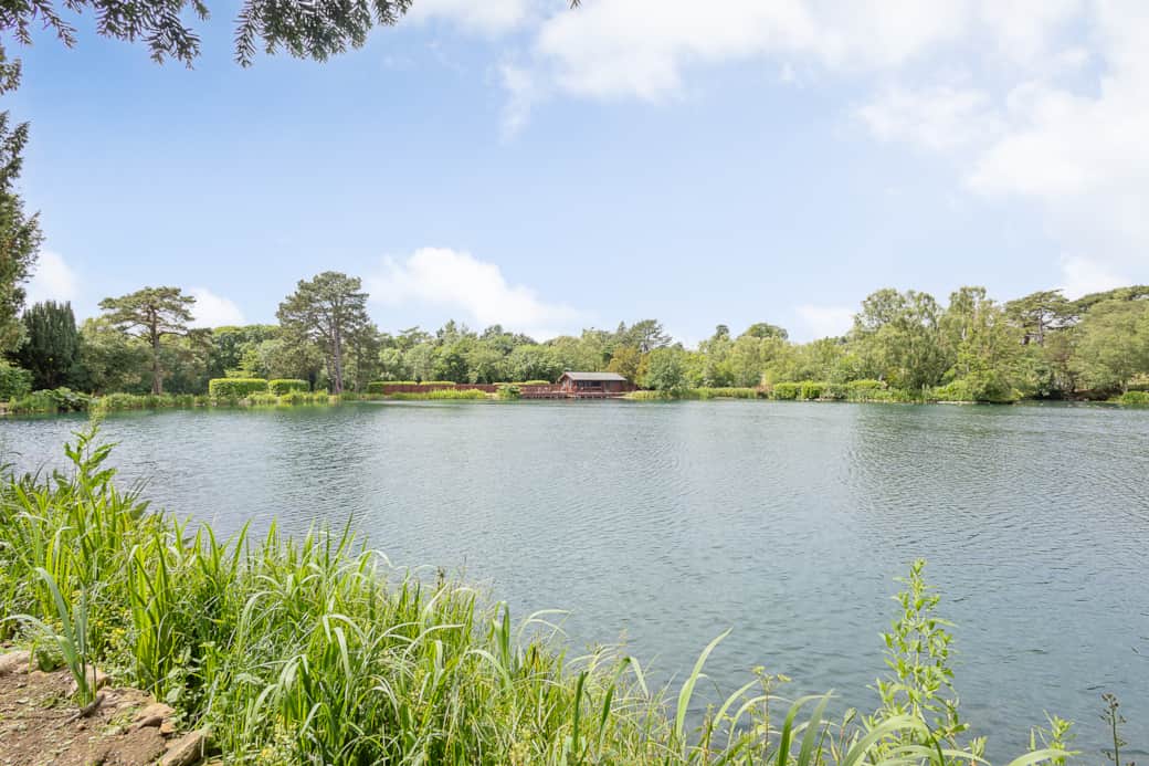 Cabin from far side of lake 1