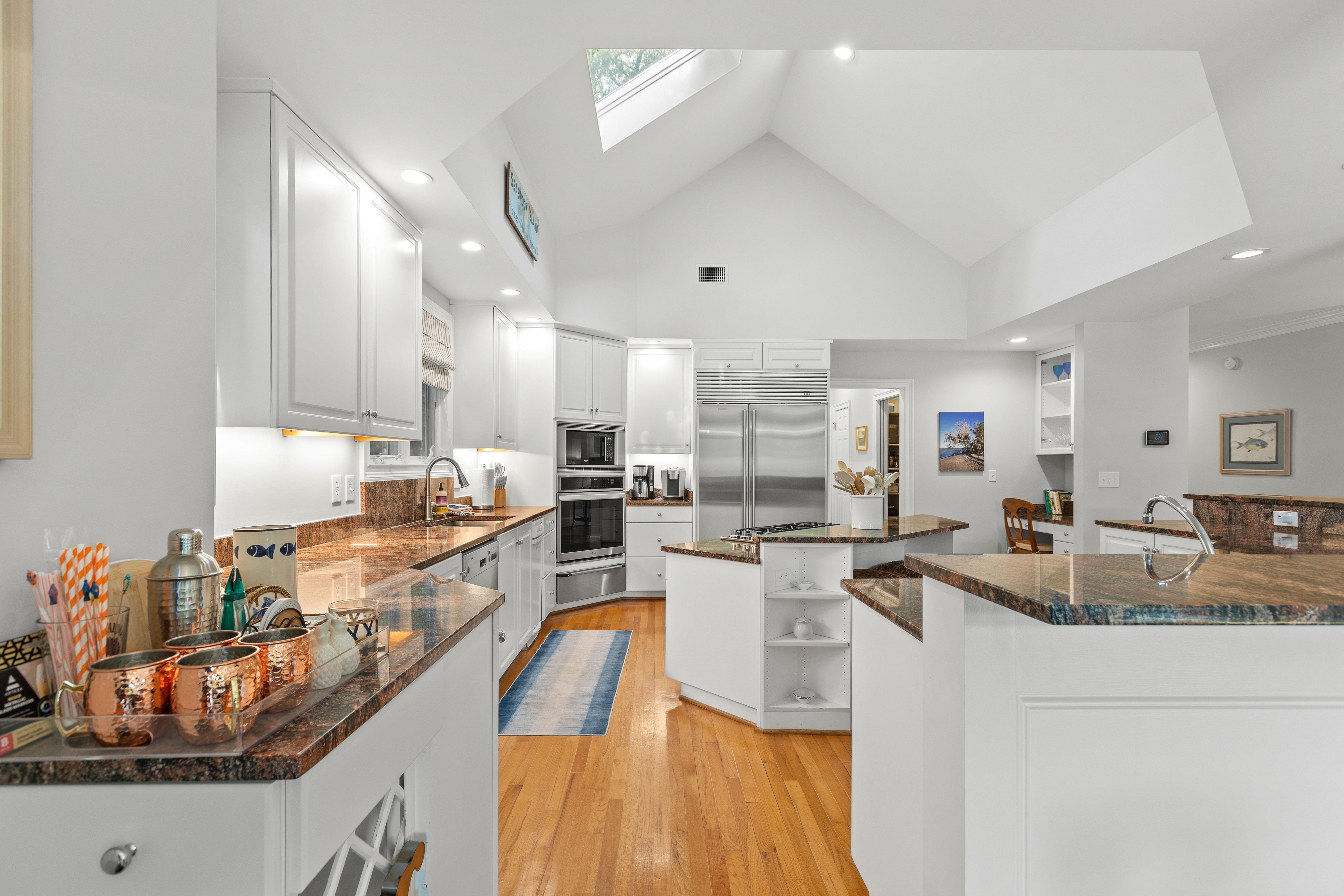 Skylight and vaulted ceiling over the working end of the kitchen