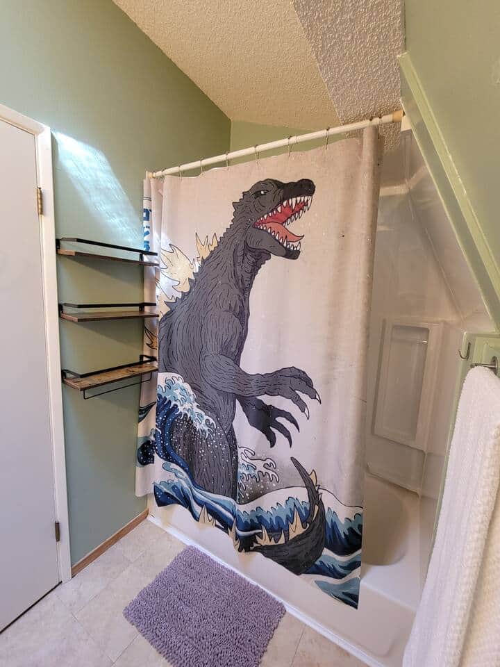 Upstairs bathtub and shower. 