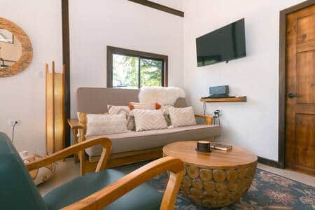 Sunlit, spacious, sleek living room