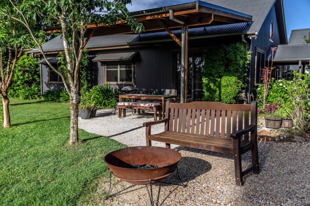 Cottage private patio, BBQ and firepit with sunset views for relaxed evenings outdoors Cottage private patio, BBQ and firepit with sunset views for relaxed evenings outdoors