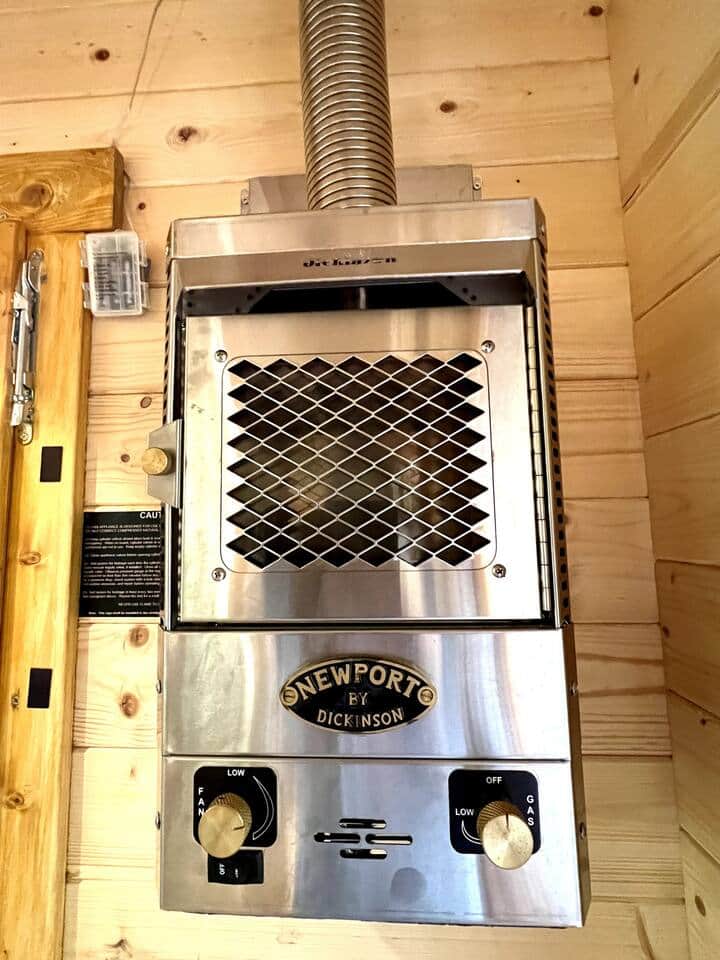 Propane heater features a flame for ambiance Propane heater features a flame for ambiance