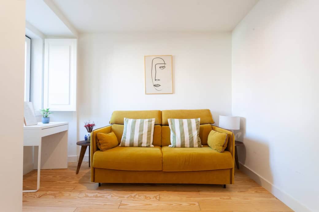 Sofa folds out into a double bed (140cm * 200cm). It is more like a bed than a sofa bed. It has a real memory foam mattress. The sofa itself is made with fabric that both feels good and is antimicrobial, so also good for people with allergies.