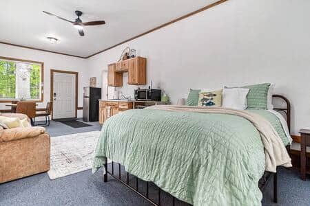 The Studio offers a kitchenette, queen bed, queen sofa sleeper, table and chairs. The Studio offers a kitchenette, queen bed, queen sofa sleeper, table and chairs.