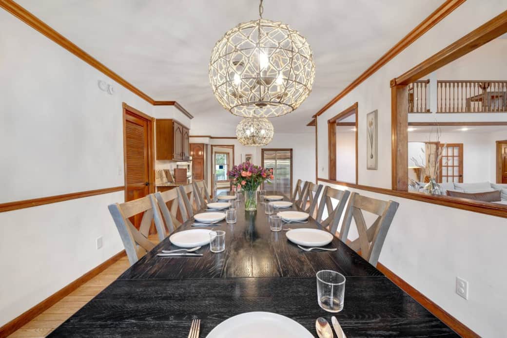 Share memorable meals in the spacious dining room, where a beautifully set table seats up to 12 guests. Perfect for family dinners, celebrations, or long conversations over some local wine.