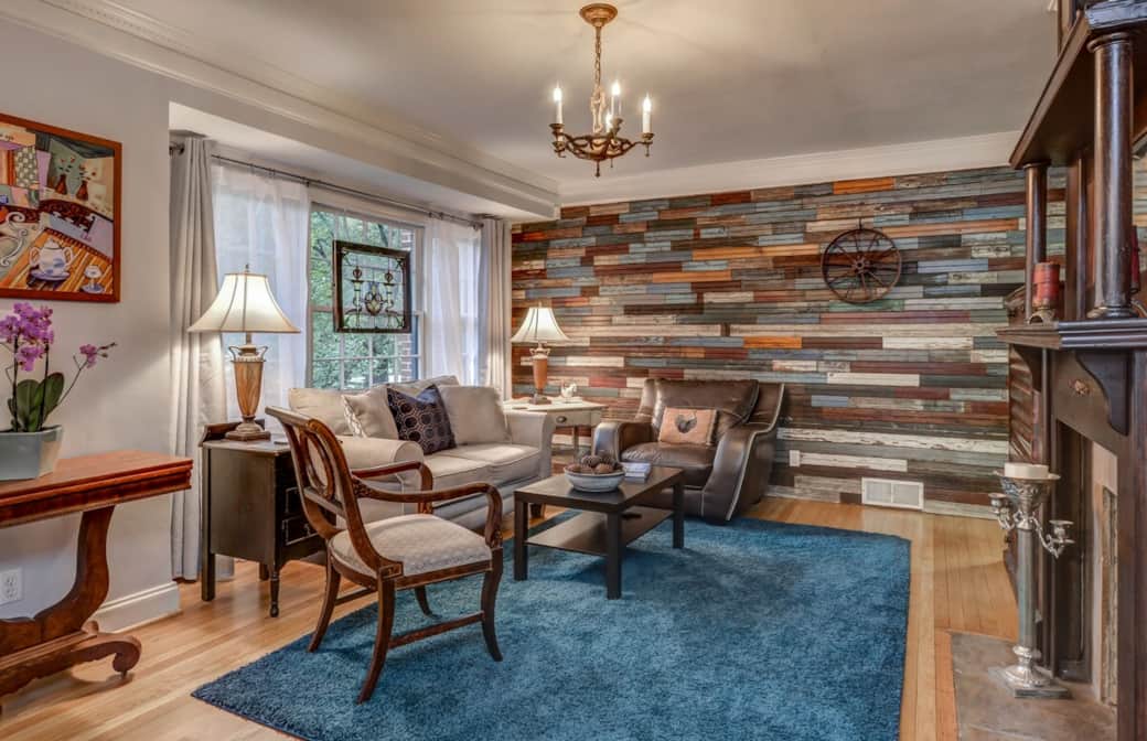 Our spacious designer renovated  living room features a wall of 120 year old beaded board, an antique mahogany victorian mantel, original white oak floors, stained glass, and comfortable furniture.  Our large flat screen tv has roku, both packages for loads of entertainment.