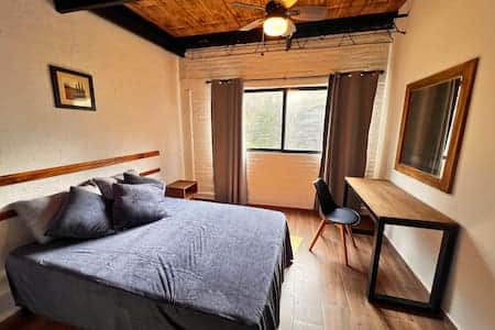 Room 9: Large windows bring in natural light, creating a warm and welcoming atmosphere.