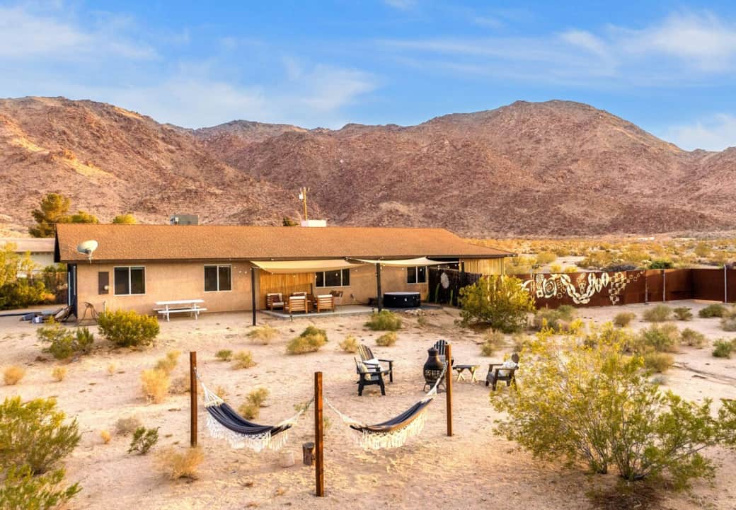 So much to do without leaving the yard — lounge in hammocks, take a dip, catch a movie outdoors, or gather around the firepit under the stars. The fenced-in space is fully enclosed, perfect for pets and little ones to run around