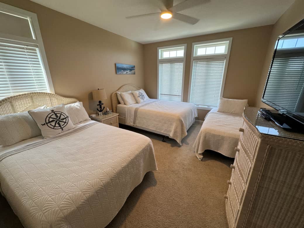Second bedroom, three beds and plenty of light!