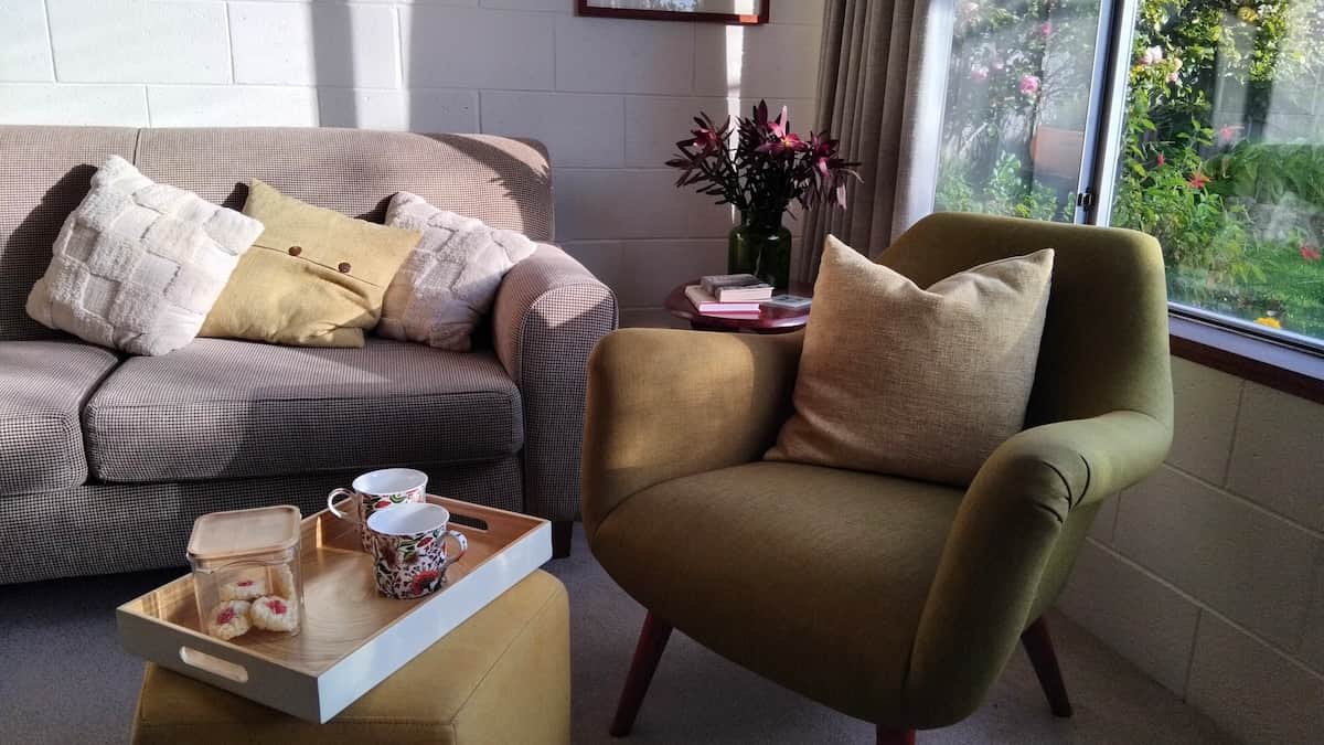 Sunny seating with picture window views of your private garden.
