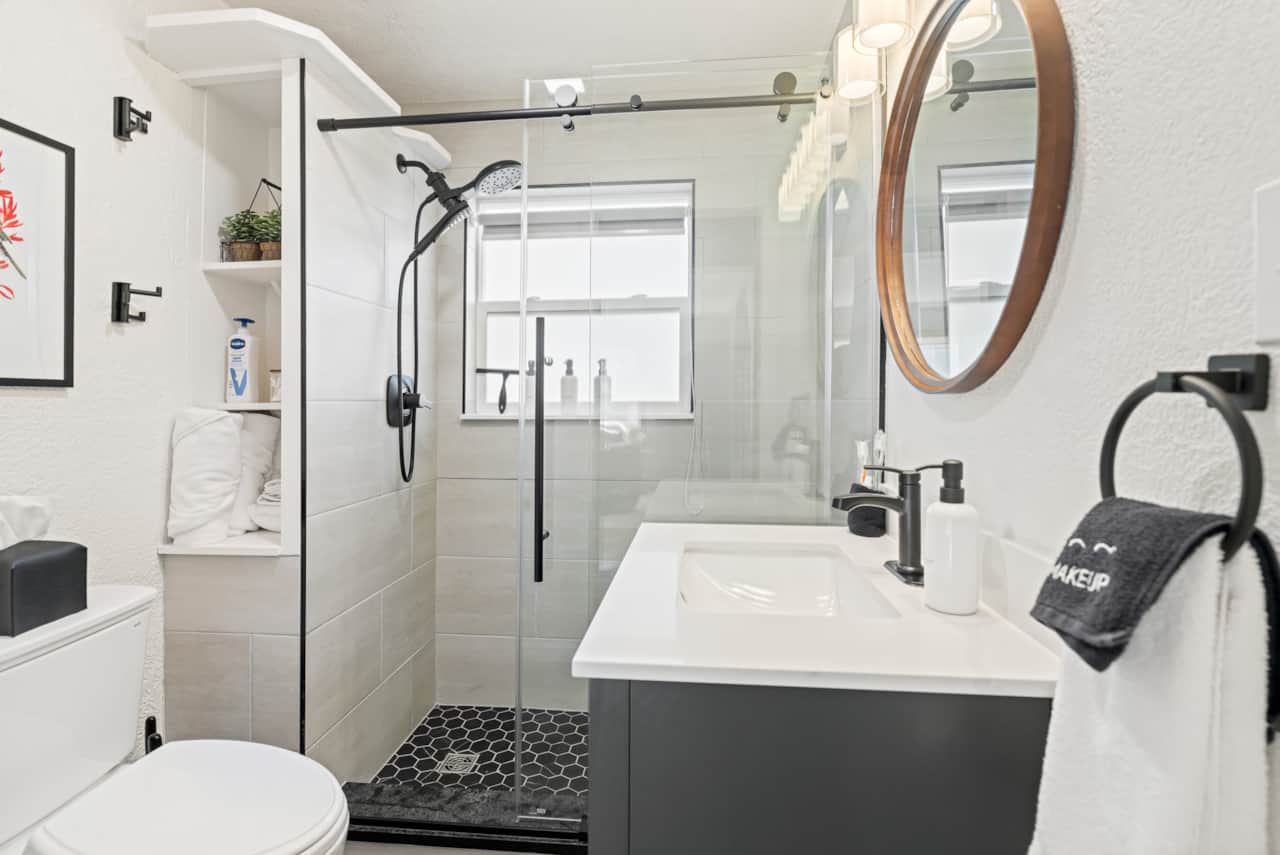 Bathroom Retreat: Modern elegance meets functionality with a spacious walk-in shower and stylish dec
