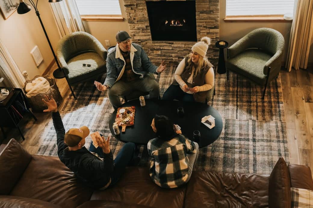 Gather around the fireplace for game night, laughter, and quality time together.