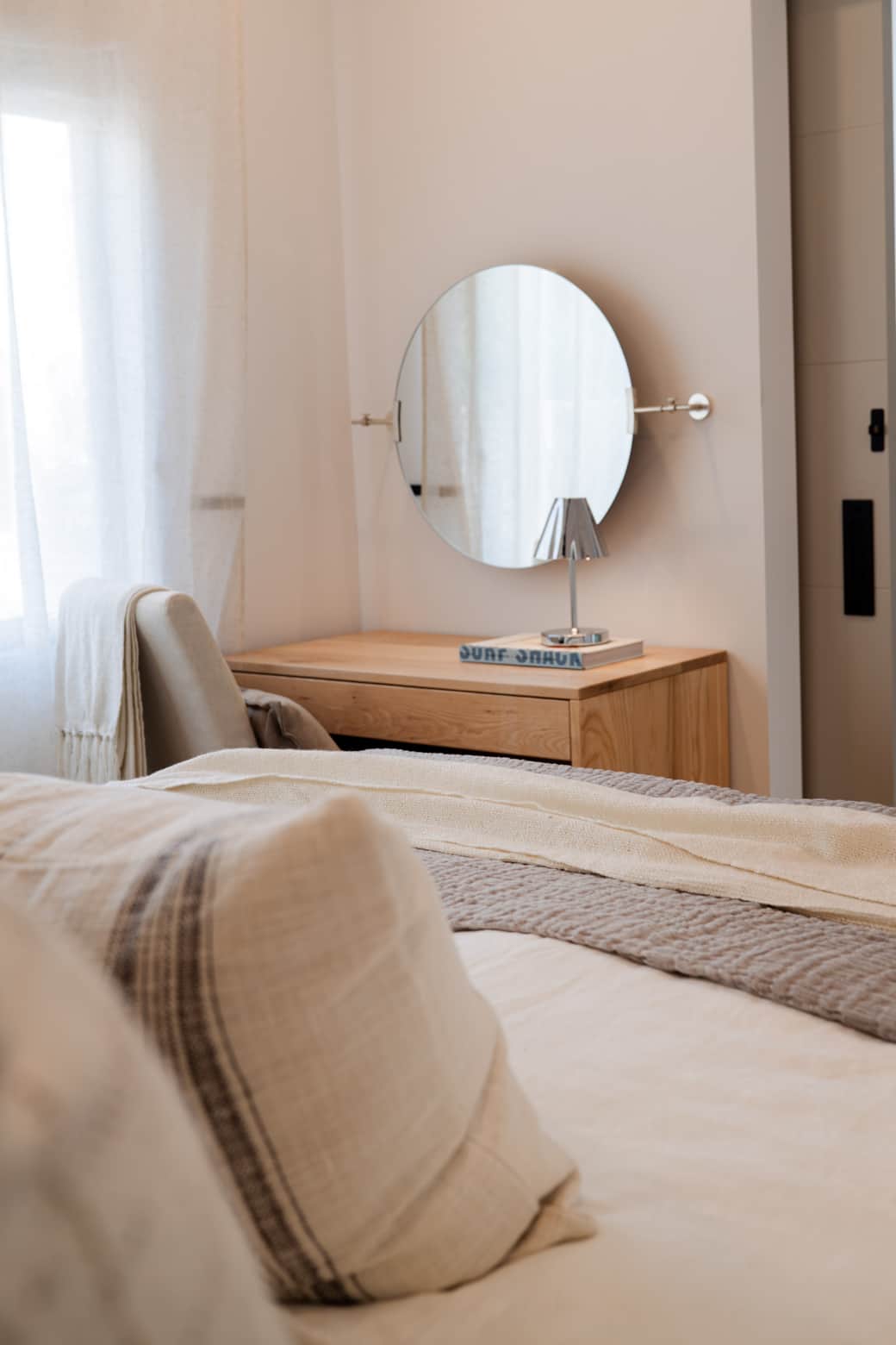 Stylish bedroom with queen bed, ensuite, and desk for vanity or work space. Stylish bedroom with queen bed, ensuite, and desk for vanity or work space.