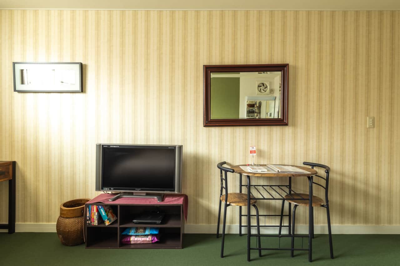 A small dining nook and entertainment setup ideal for evening downtime