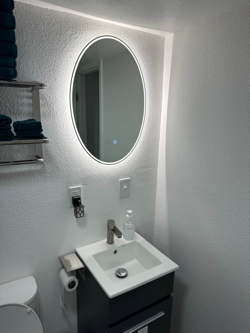 Bathroom sink and touch mirror Bathroom sink and touch mirror