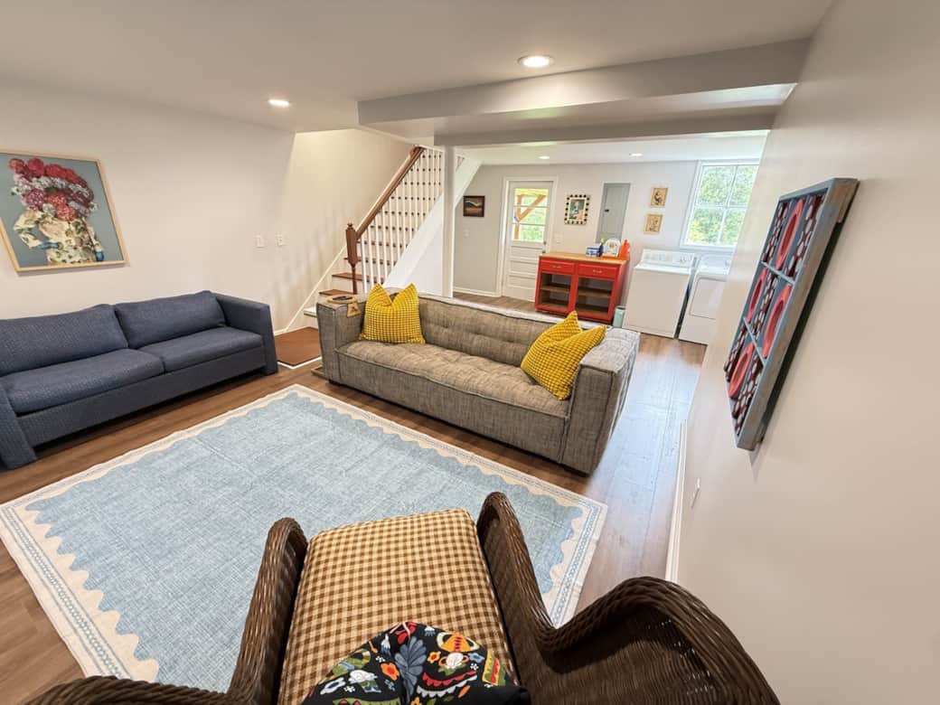 The blue sofa has a pull-out bed. The blue sofa has a pull-out bed.