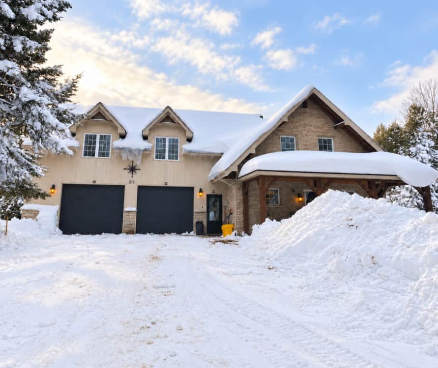 Front exterior of the Riverfront Hideaway as a Winter Wonderland.