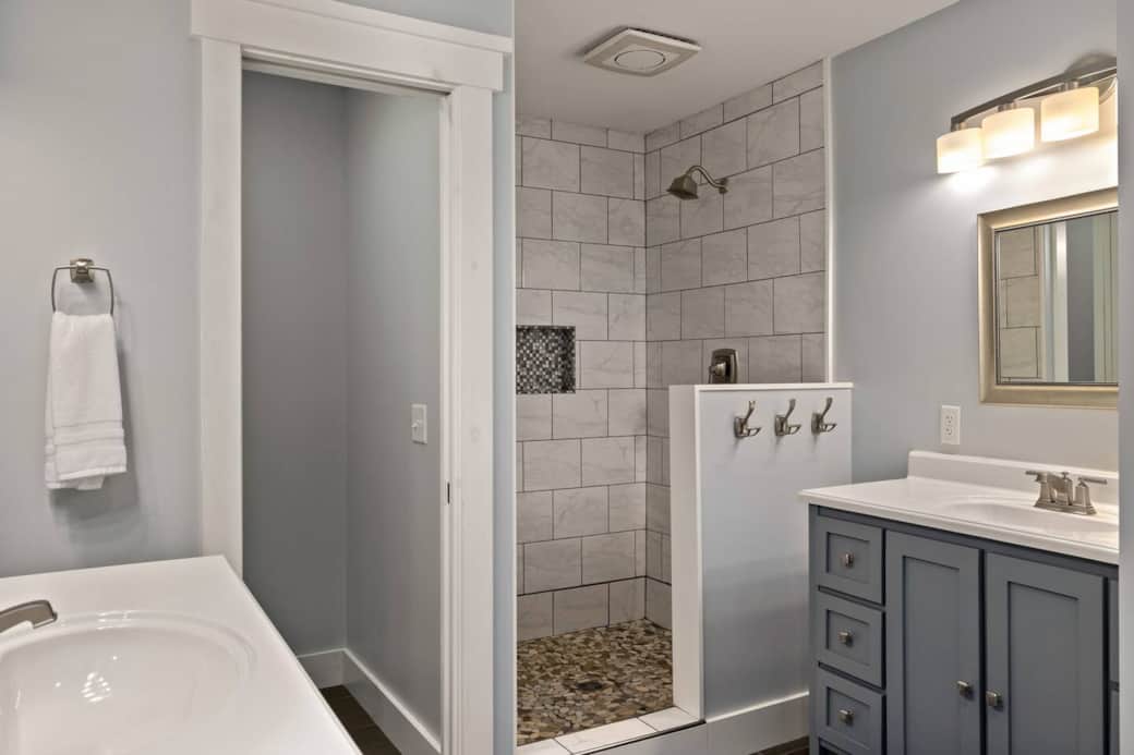 The separate vanities, full-length mirror and spacious layout in the master bathroom provide everything you need for your morning and evening routine.