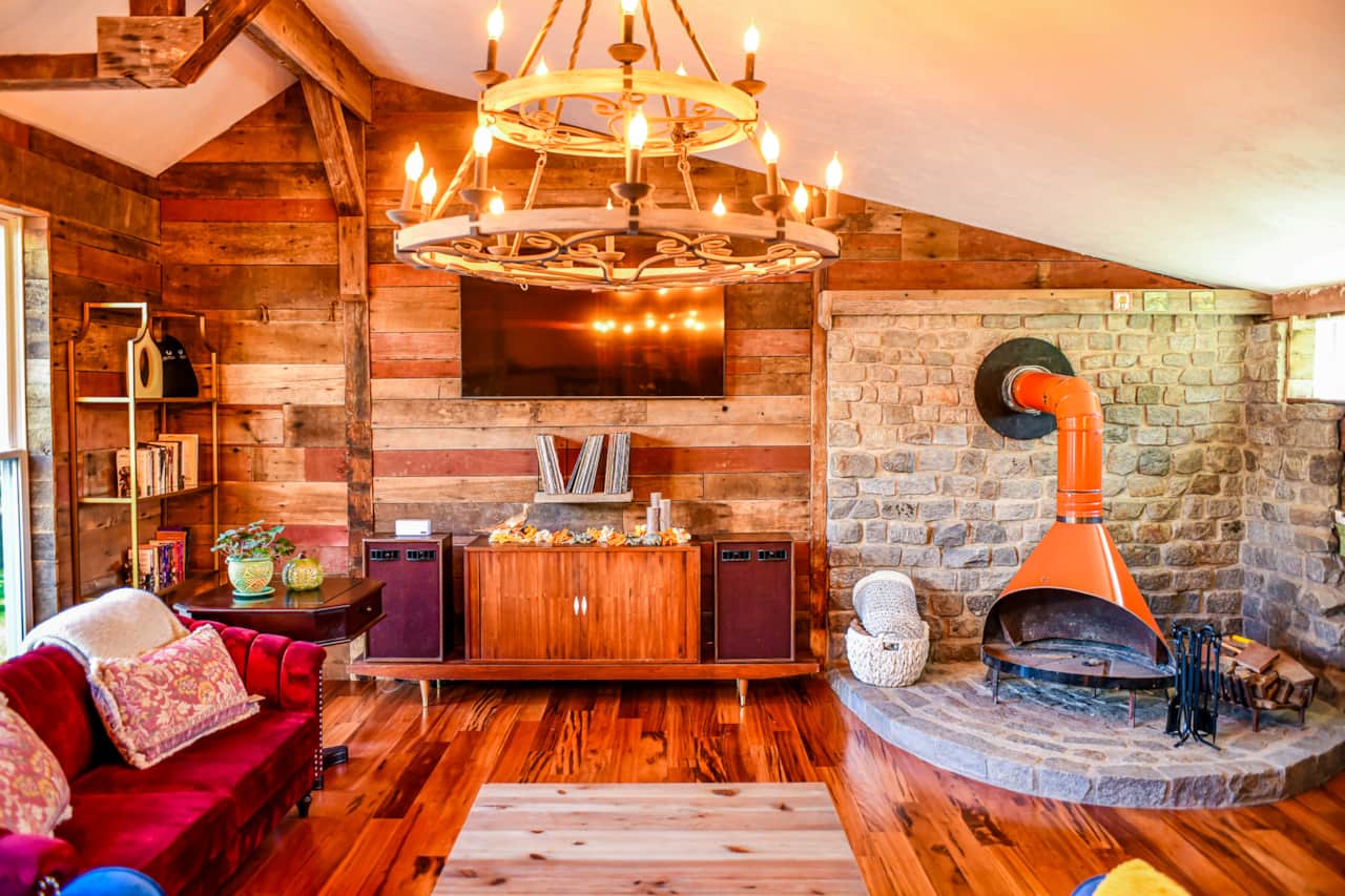 Living area with vintage fireplace and record player