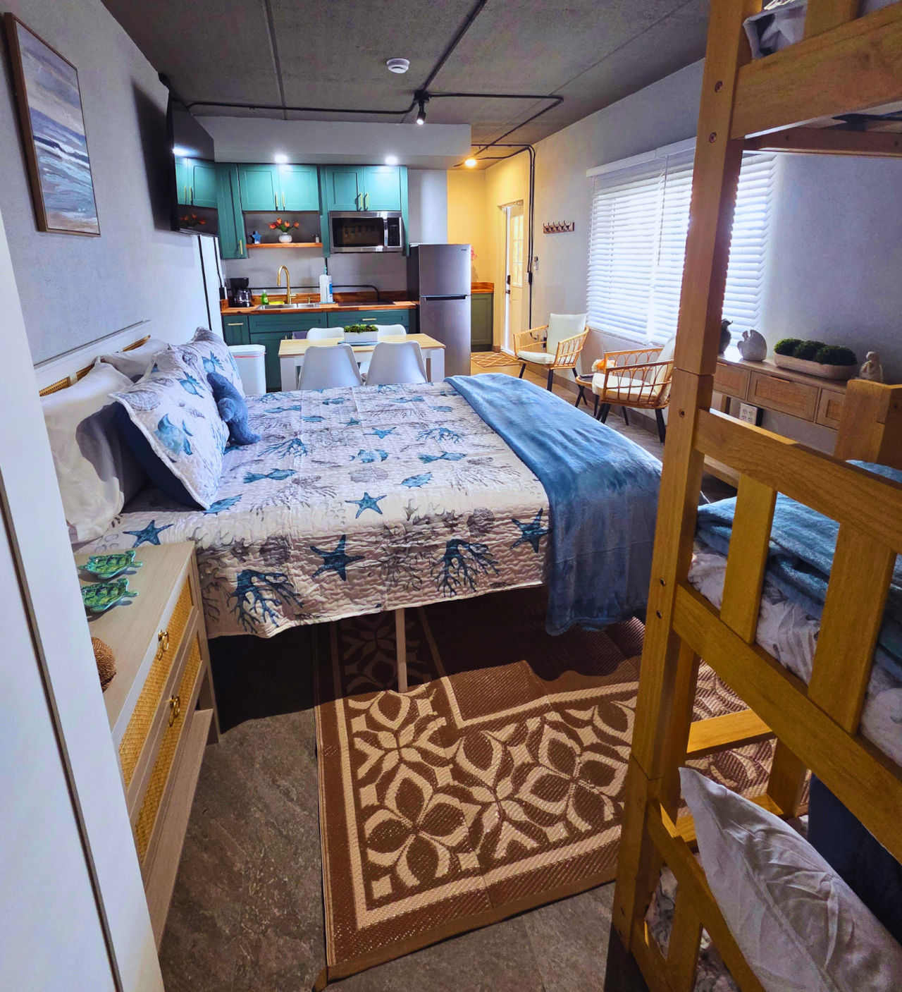 Modern studio offering a lounge, dining space, equipped kitchen, and full bath.  Treasure Island, FL