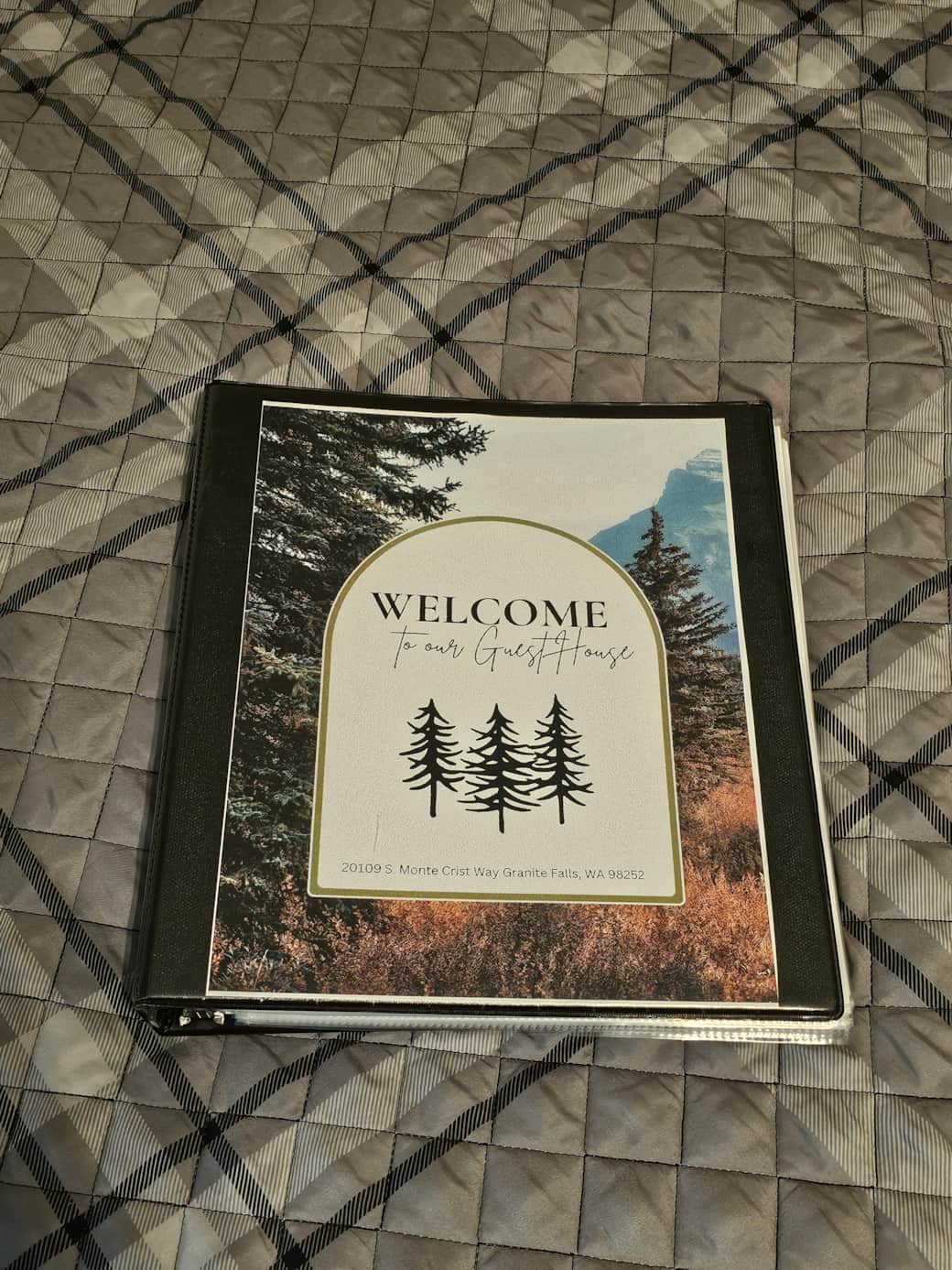 Welcome book with info on cabin and area attractions like restaurants, grocery stores, and popular hiking spots.