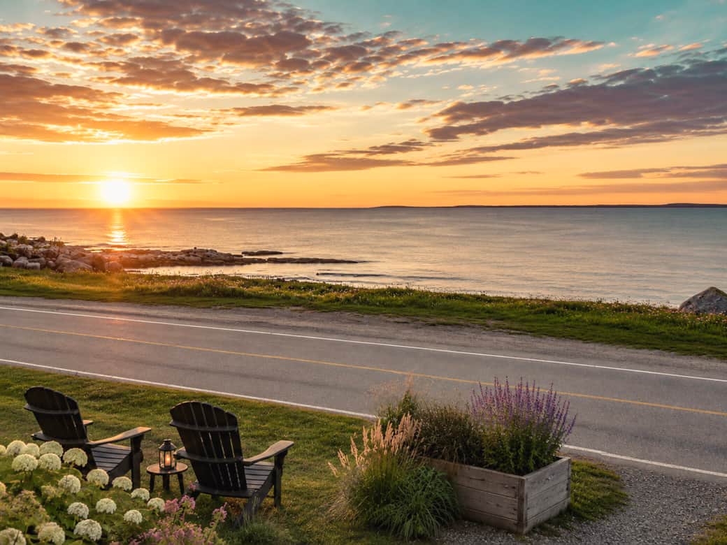 Vue panoramique : Splendide coucher de soleil sur le fleuve depuis le chalet.
