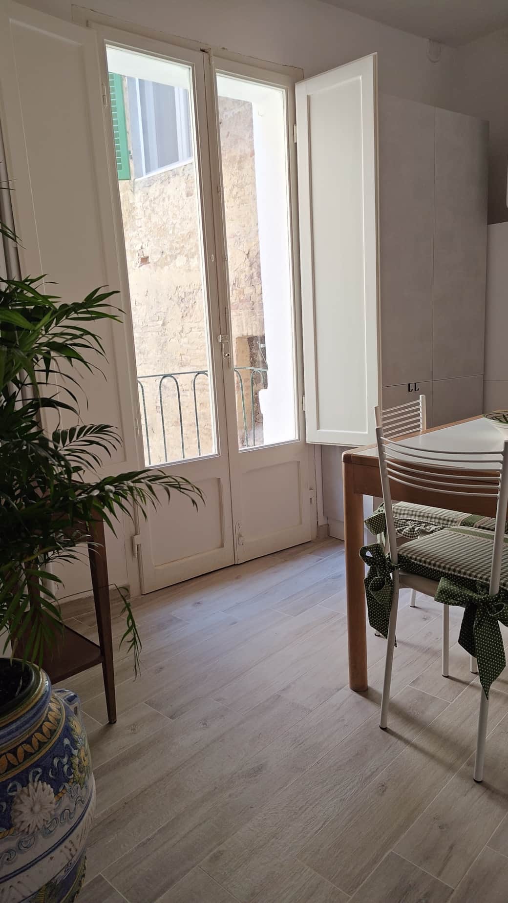 Kitchen eating table and balcony