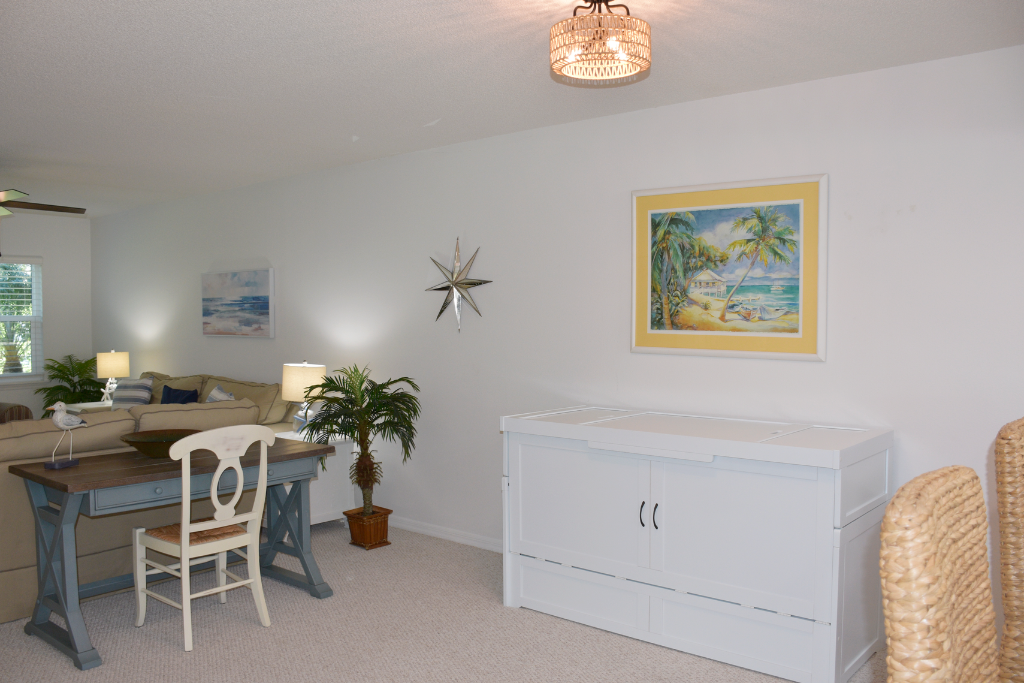 Desk, hidden bed, and living room vibes—perfect for a flexible getaway.