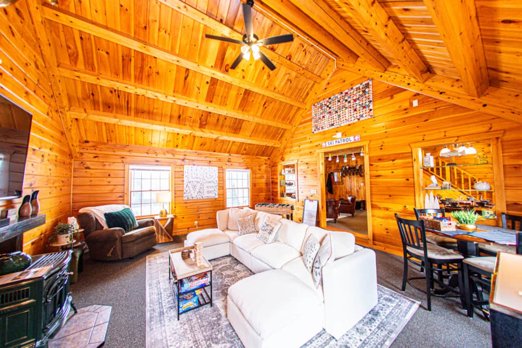 Huge living room with bar and card table