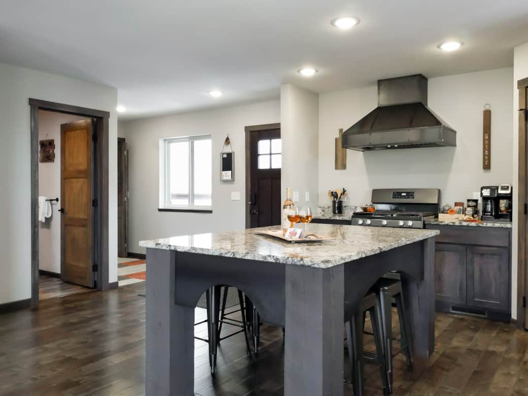 Kitchen Area - gas range - with entrance pictured