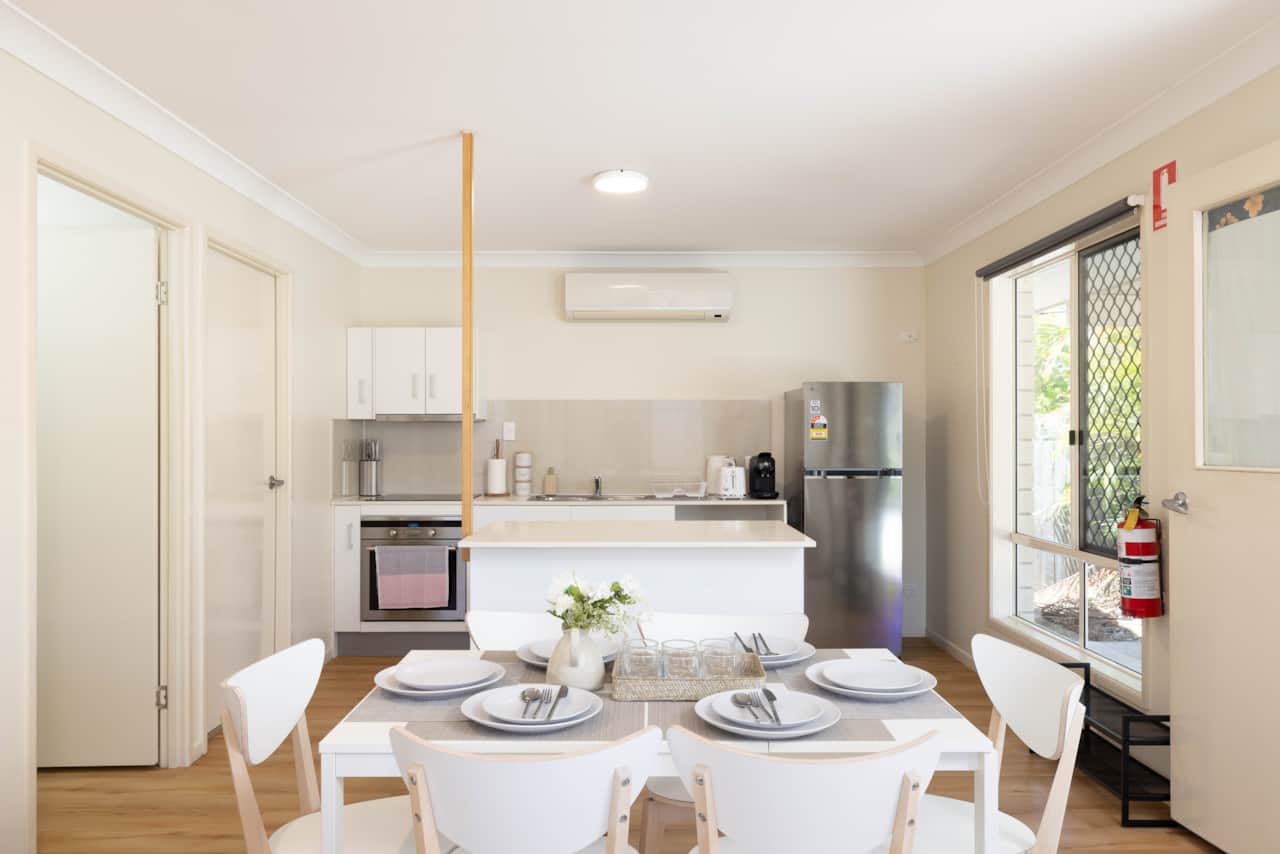 Dining Area: Integrated dining area within open living layout
