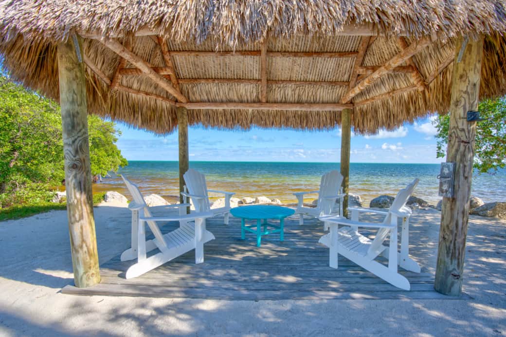 Tiki Hut and chairs on the Man Made Beach. Tiki Hut and chairs on the Man Made Beach.