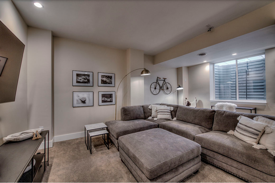 basement entertainment room with 65” tv basement entertainment room with 65” tv