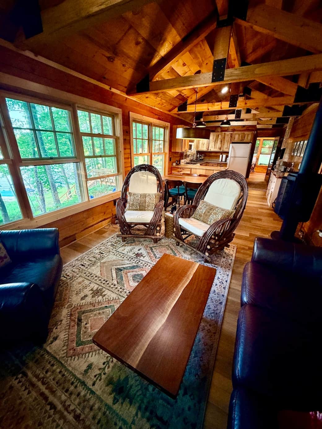 Inside, Green Wolf Lodge combines modern comforts with vintage Northwoods character. Relax in comfortable living space, take in stunning lake views, and wake up to beautiful sunrises over the water.
