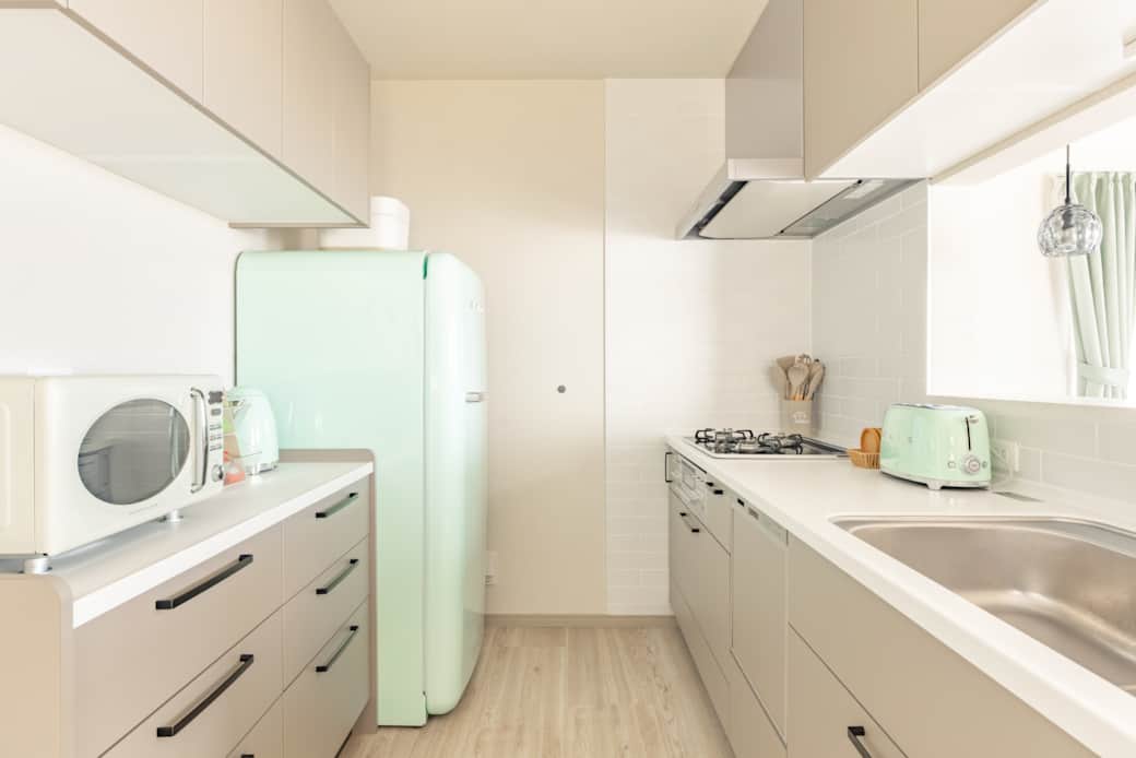 Retro fridge and microwave in kitchen