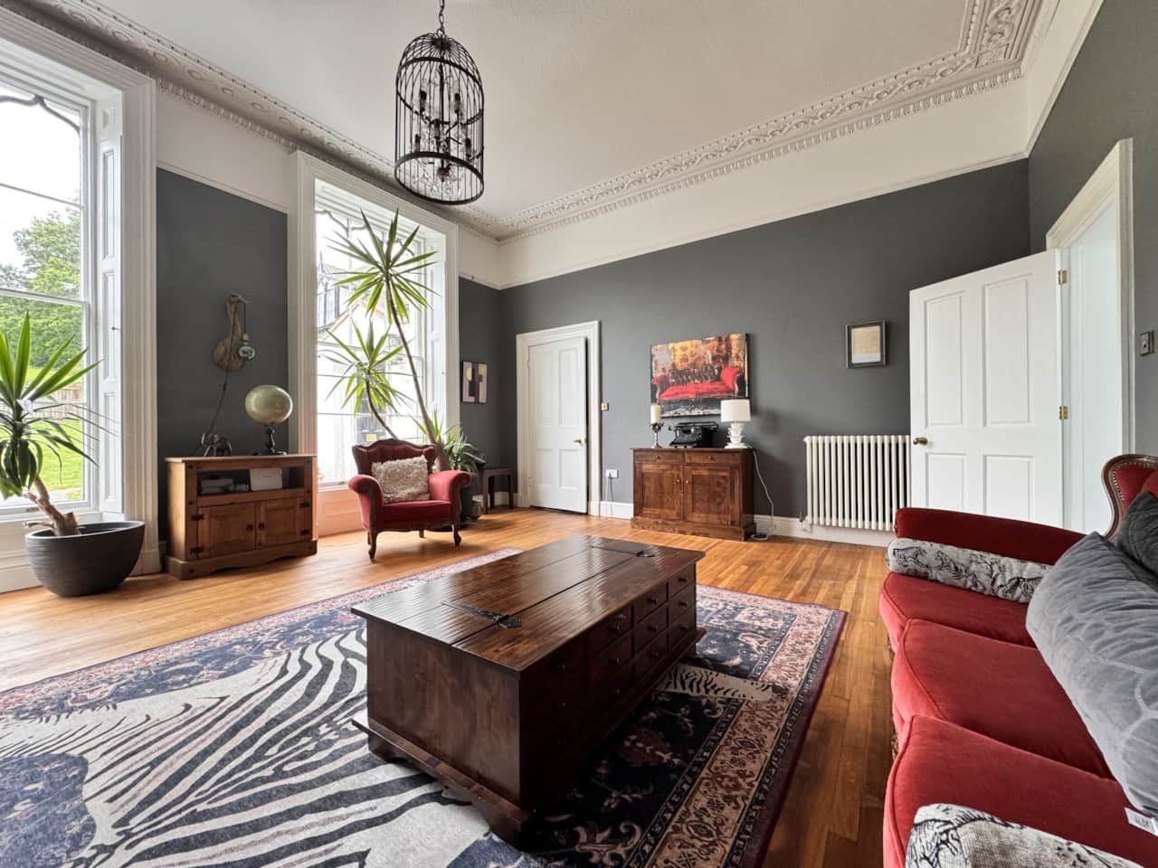 Drawing room with tall windows and period details