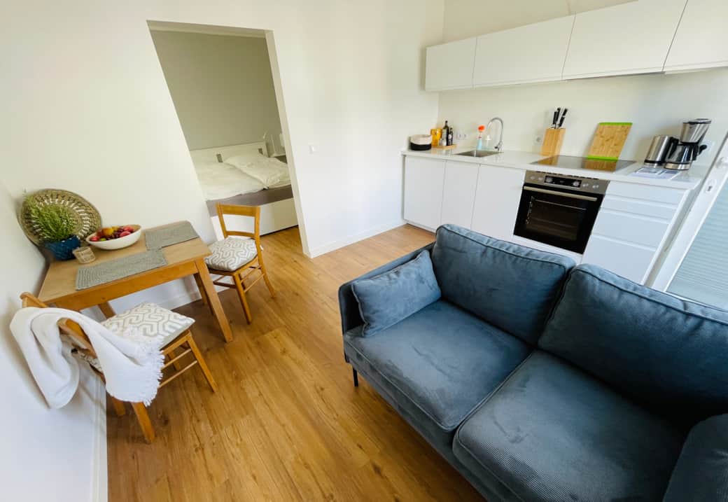 Wohnzimmer mit Küche
