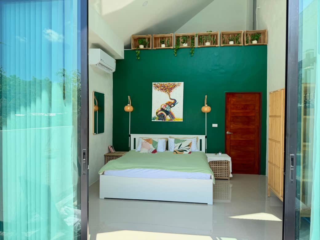 Wake up to the serene sight of the pool from the comfort of your private master suite