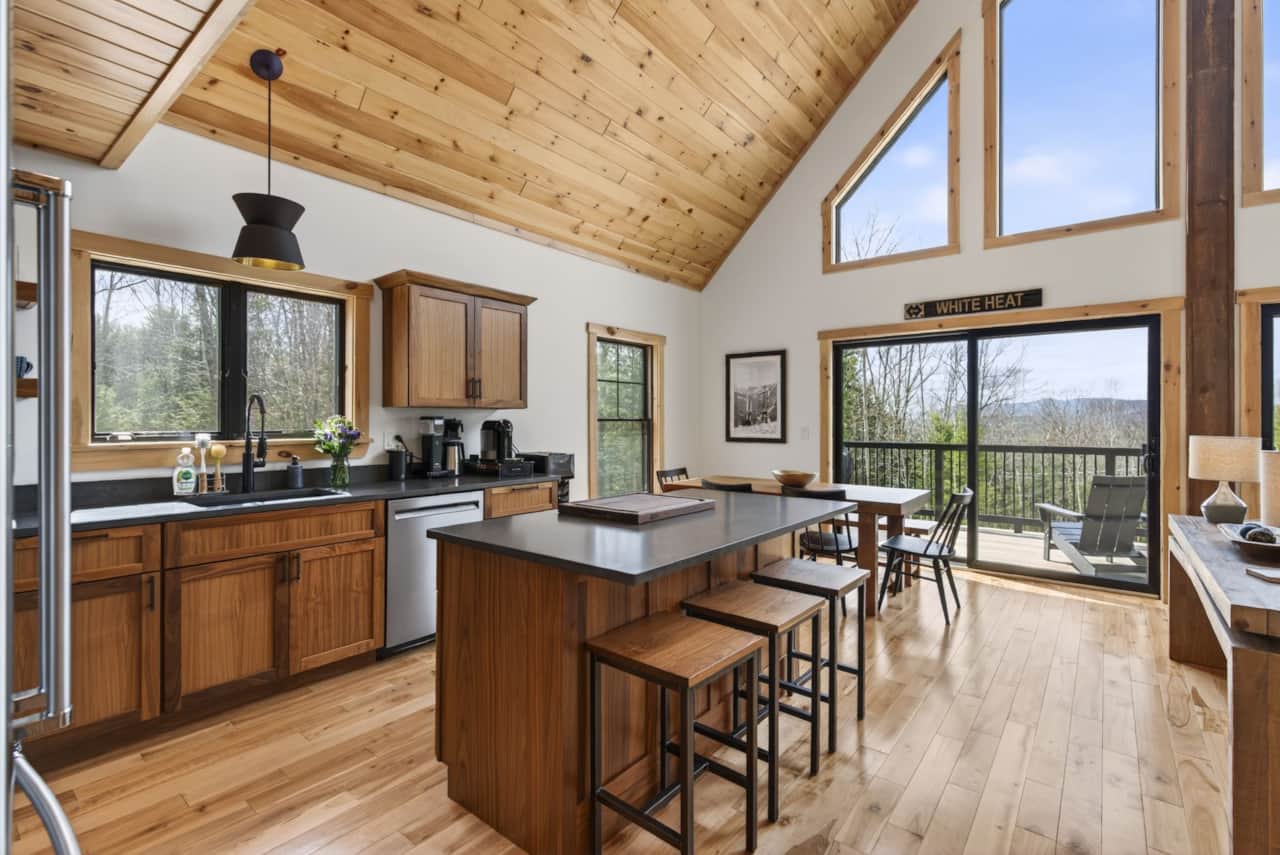 Open chef’s kitchen with island seating and room to gather