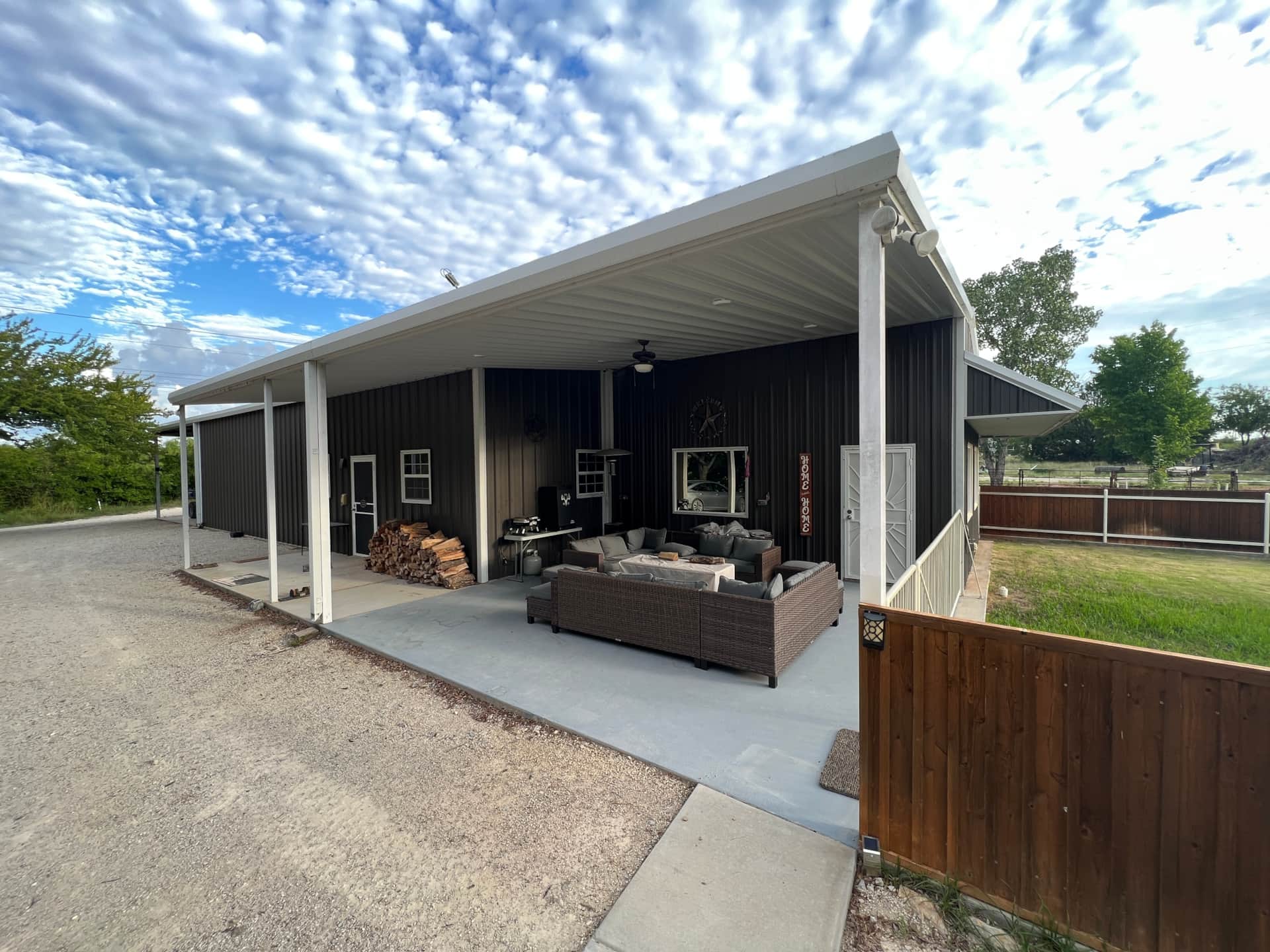 Spacious porch of the Lake Godstone Guest Home with lake views, ideal for family reunion gatherings in Graford, Texas