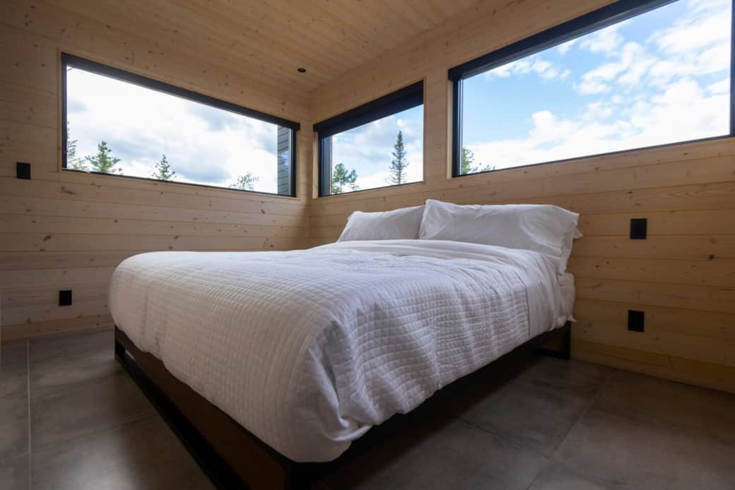 Masters bedroom with king size bed and attached bathroom