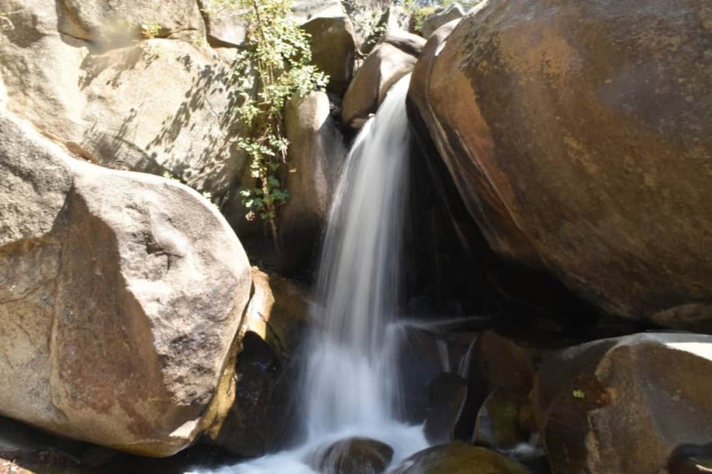 The river is steps from your door — wade in, explore the rocks, or just sit and enjoy the peaceful flow
