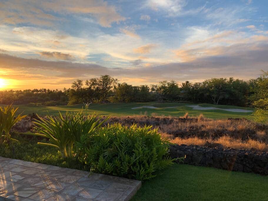 Sunset views of the golf course from the outdoor dining area.