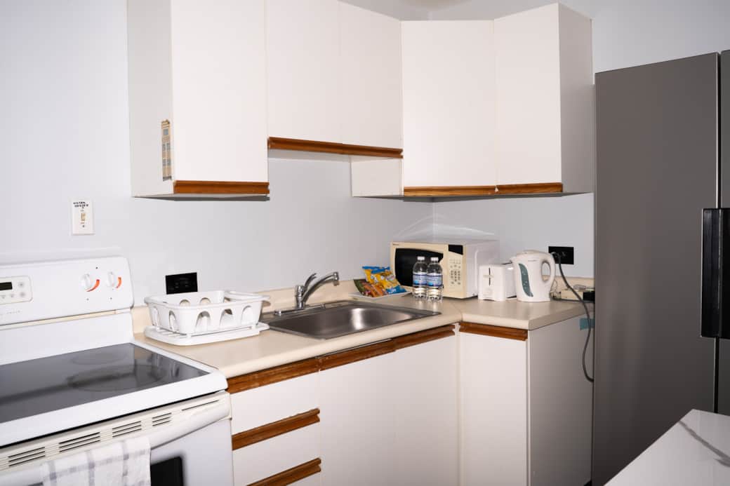 Fully equipped kitchen — fridge, stove, microwave & everything for long stays