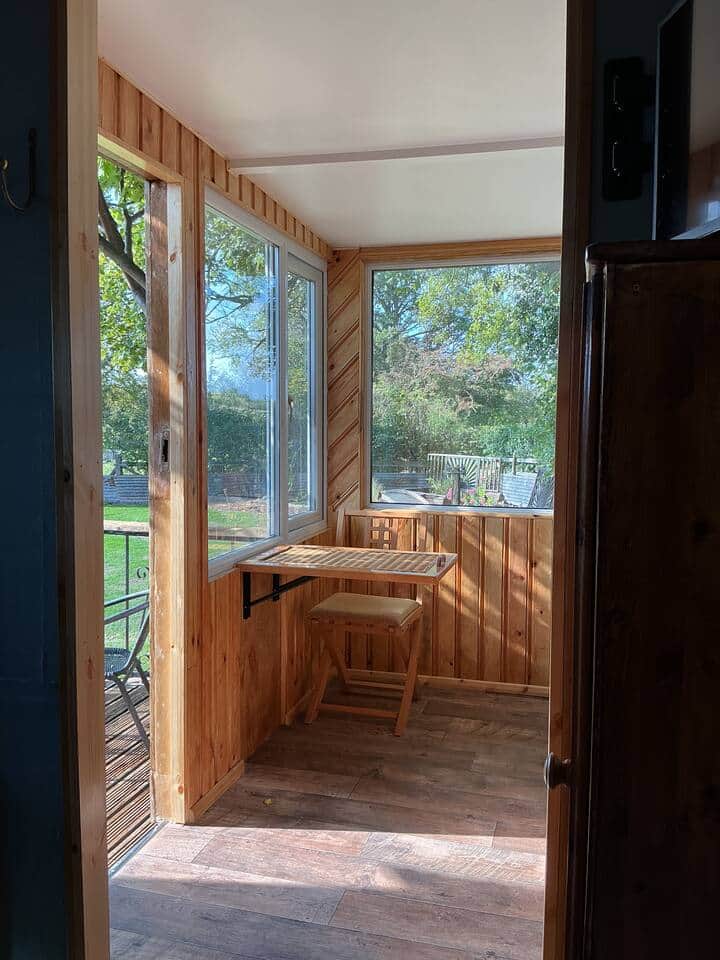 Fold down coffee table for space saving.