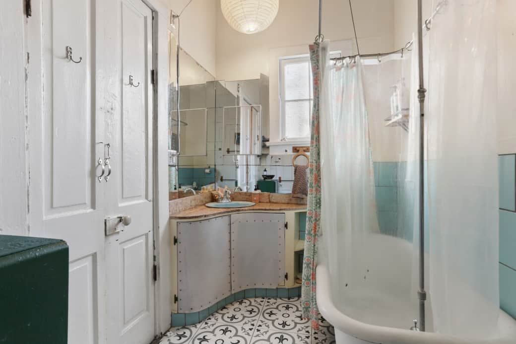 Custom vanity and clawfoot tub