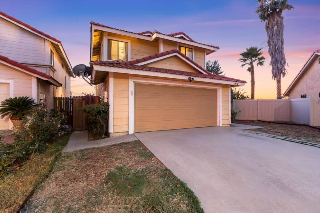 Arrive in comfort with parking for two in the garage or driveway. Charming curb appeal awaits.