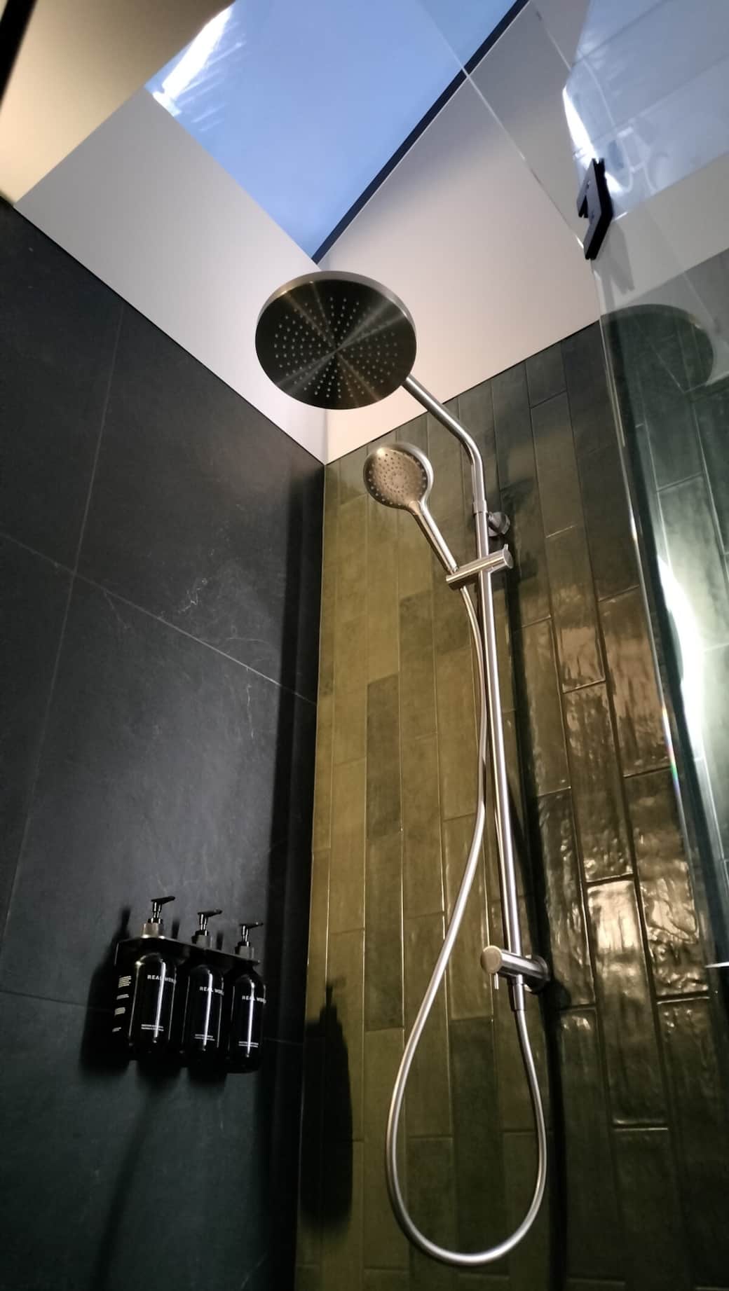 A large skylight above the rain shower floods the bathroom with sunlight. Or enjoy a luxurious shower under the stars with premium, all natural Real World products. 
