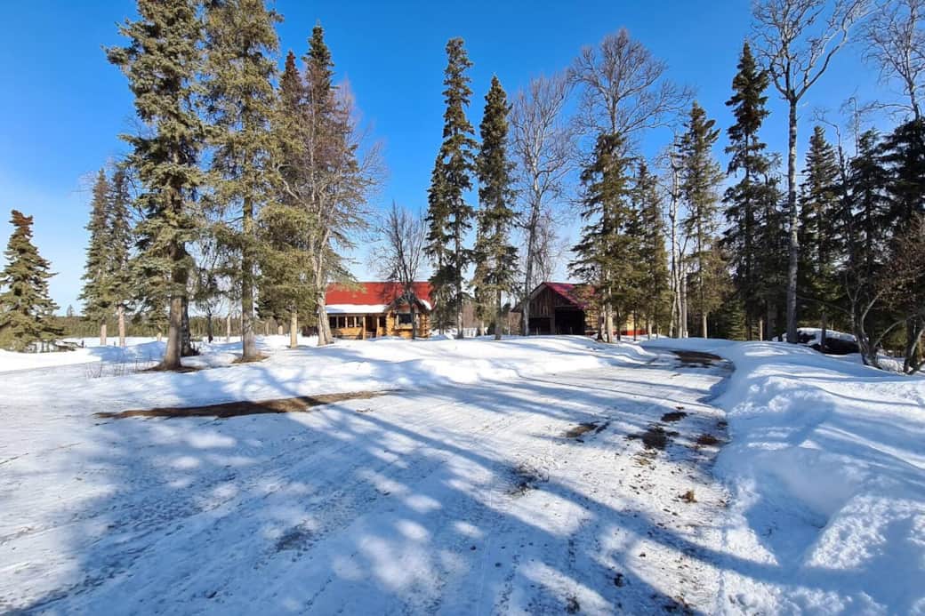 This is the large circle driveway, which allows for easy access when pulling snowmachine trailers, etc. This is the large circle driveway, which allows for easy access when pulling snowmachine trailers, etc.