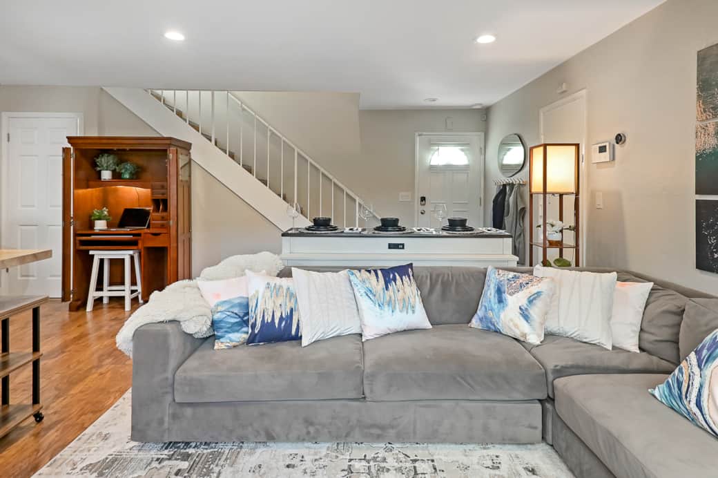 Beautiful, Comfortable, Custom L Couch from Wayfair. Bar Style Seating Behind the Couch Facing TV